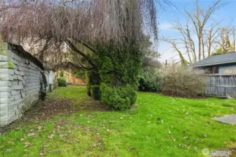 Expansive, level backyard with plenty of room for gardening, pets, and play. The added bonus? This space is a future goldmine—the rare alley access and zoning allow for additional dwellings down the road. Buy for the yard, keep for the potential.