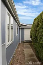 Side with access to garage from backyard