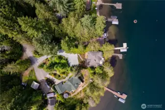Freshly layed gravel driveway, with room for cars to park.