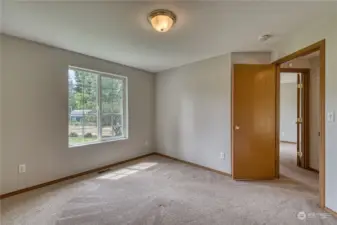 Bedroom #1 is spacious, with large window.