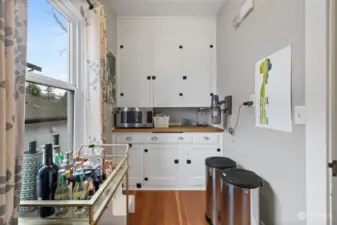 You won't run out of room with this roomy pantry off the kitchen - even has it's own natural light!