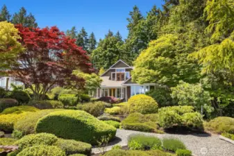 Jewel box on .75 acres surrounded by stunning grounds with spectacular Sound, Cascade, Seattle, and Mt. Rainier views.