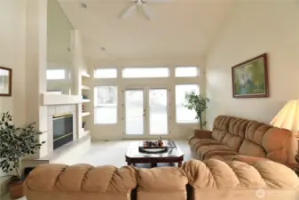living room with door to backyard