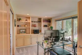 Easily accessed office with pocket doors for privacy