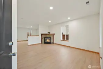 Spacius living room with gas fireplace