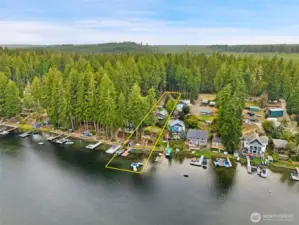 60+/- ft of private lakefront.