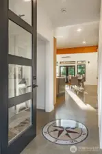 There's a flow of positive energy that welcomes you inside, and the compass rose symbolizes direction with purpose.