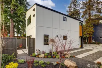 Stylish new build home with a striking facade and custom vertical windows.