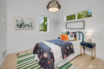 Second bedroom can easily accommodate a queen size bed. Each bedroom features individually controlled heat for everyone's comfort.