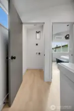 Washer and dryer hook-ups are located at the top of the stairs on the second level.