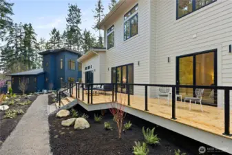 Bliss Gardens designed low maintenance landscaping with sprinkler system and landscape lighting