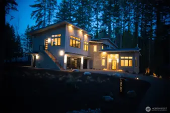 Evening exterior, lighted address sign