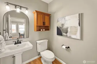 Stylish powder room off of the main level