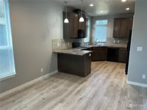 Kitchen from eating area/dining room.