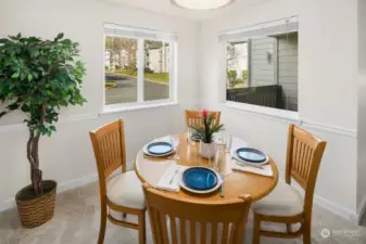 Thanks to two windows, there's plenty of natural light in the dining area.