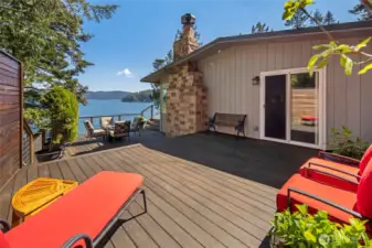 Private patio off the primary bedroom with water views.