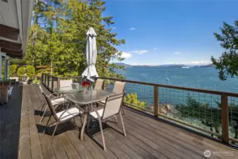Solid IPE hardwood deck surrounds the house.