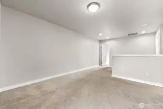 The upstairs loft works well as an office, den, or playroom.