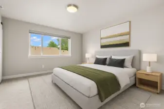 Virtually staged primary suite.