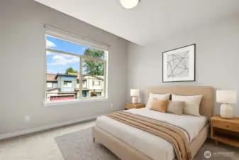 Virtually staged bedroom (2 of 3 upstairs).