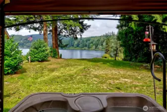 Hot tub time with a view of the lake and foothills
