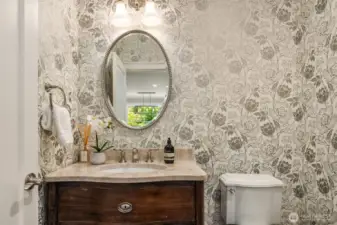 Powder room with wallpaper