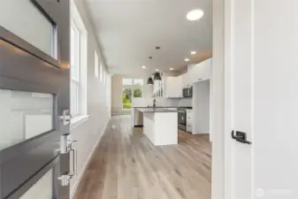 Kitchen & entry pic for reference of like unit. 555 Northview is under construction.