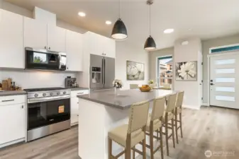 Kitchen, staged photo of a different unit but the same Peaks model for reference only.