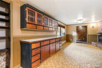 Kitchen looking toward front door and living area/dining room