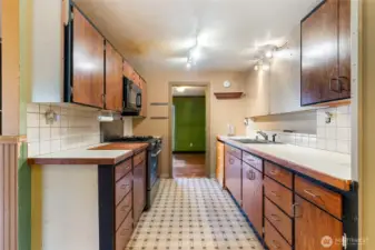 Both living rooms have access to the kitchen