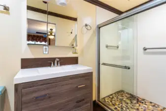 3/4 bath off bedroom in old garage/living area