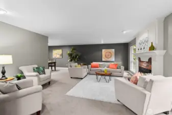 The long living room includes plenty of wall space for art, a music or library nook and more.