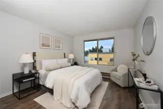 Western views from both bedrooms of sunsets, the Olympic Mtns and a peek at the Puget Sound.