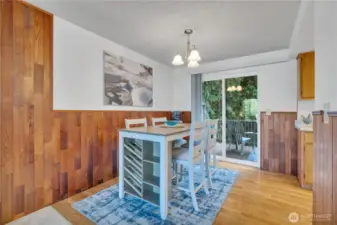 Dining area accesses new deck that overlooks the Green Space