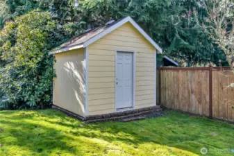 Side yard lawn space and matching 10X10 Shed