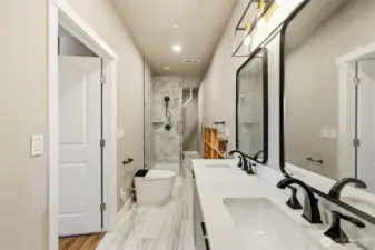 Second bathroom in the basement with washer and dryer