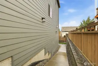 Walkway to the basement is illuminated with exterior lights