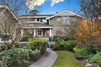 Meander through the private front yard heading to front foor