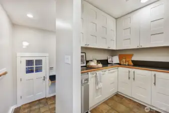 Pantry off the kitchen down to the mud room