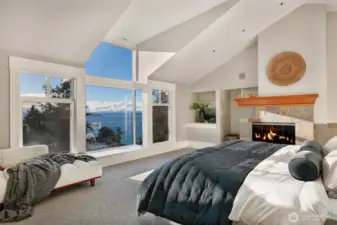 The primary suite with a generous window seat to enjoy expansive views