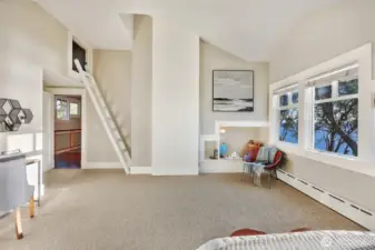 The nooks and ladders to lofts continue; it's a playful home