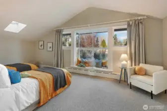 Bedroom #4; faces east over the front yard where you can enjoy the beautiful blooming trees