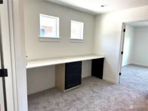 sample - upstairs loft area w/ built in desk