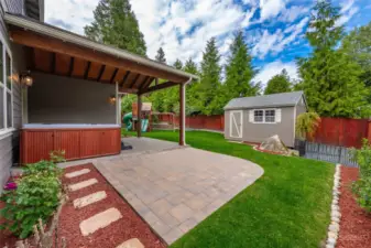 Fully mature backyard with shed and play set