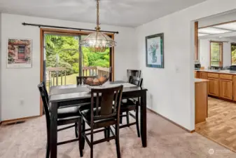 Formal Dining with slider to back yard and close to kitchen for ease of entertaining.
