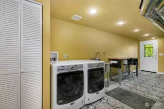 Spacious utility room with storage.