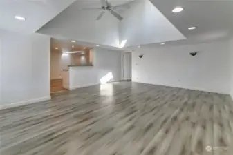 view of great room from SE corner looking back towards kitchen and primary bedroom