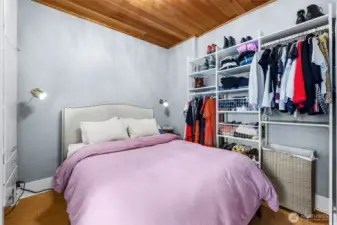 Pine ceiling and built in closet organizer with more built in storage
