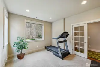 The second office is off the entrance and looks out to the greenspace across the street.
