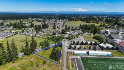 Prime commercial real estate in the Yelm city limits. Blue boundary lines are approximate. Buyer to verify to their own satisfaction.